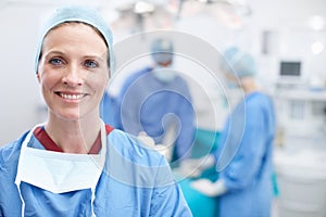 Laughter and happiness are the best medicine. Portrait of a mature female doctor smiling in an operating room.