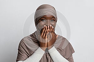 Laughter. Positive Black Muslim Woman In Hijab Covering Mouth With Hands