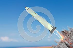 Launch of nuclear missile against blue sky. 3D rendered illustration