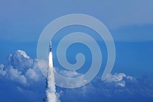 Launch of a space rocket into space. Against the background of the sky. Elements of this image were furnished by NASA