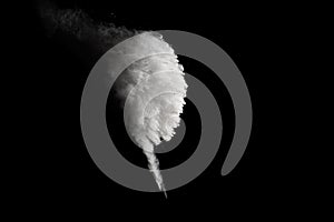 Launched white particle splash on black background. photo