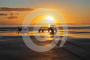 Launching the oar boat at sunrise