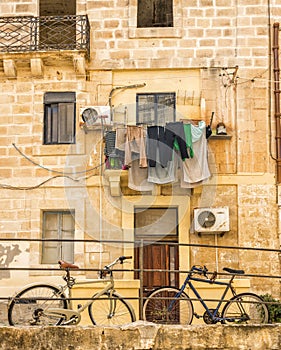 Laundery drying on maltese street