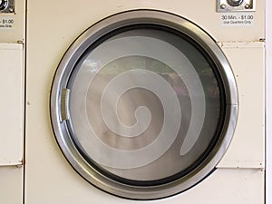 Laundromat dryer running