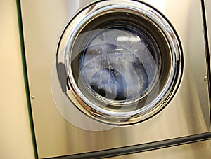 Laundromat washing machine photo