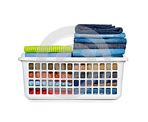 Laundry basket with folded clothes photo