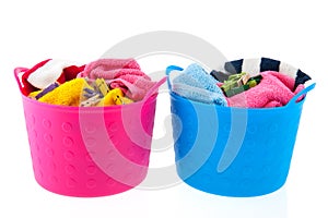 Laundry baskets in pink and blue