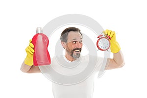 Laundry and clean. mature bearded man use detergent cleaner and clock. Cleaning time. Perfectionist complex. Cleaning of