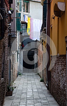 Laundry day in narrow alley in Dorsoduro, Venice photo