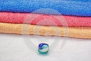 Laundry detergent pod for washing machine and colorful bath towels