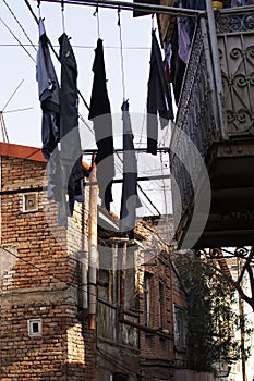 Laundry is dried outside in the center of Tbilisi, Georgia photo