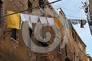 Laundry drying on a clothesline in a street in Venice