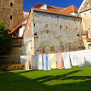Laundry drying in courtyard, Valea Viilor, Romania photo