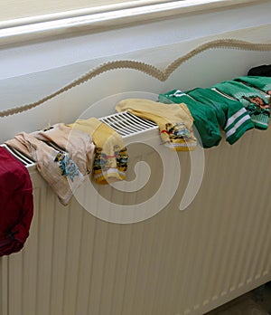 laundry drying on heating radiators, drying clothes in the home environment