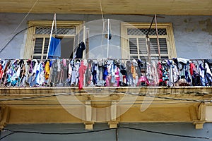Laundry Hanging Out to Dry on Balcony in Casco Viejo, Panama photo