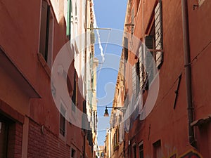 Laundry hanging out to dry in an narrow street