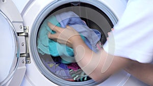 Laundry Machine Washing Disinfecting, Cleaning Clothes Chores, Spinning and Rotating, Household, Housework, Woman Working in Laund