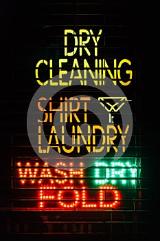 Laundry neon sign at night, in the East Village, Manhattan, New York City photo