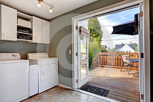 Laundry room with exit to walkout deck