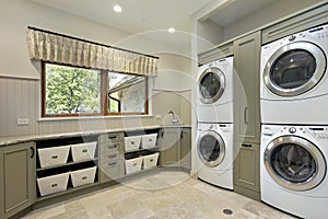 Laundry room in luxury home photo