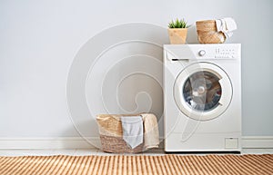 Laundry room with a washing machine