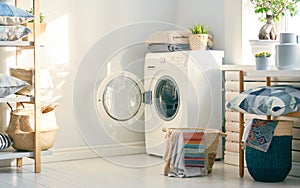 Laundry room with a washing machine