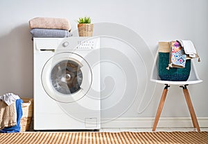 Laundry room with a washing machine