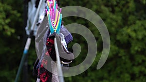 Laundry washing drying on the line with pegs