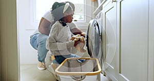 Laundry, washing machine and a father in the home with his daughter for spring cleaning or housework together. Black