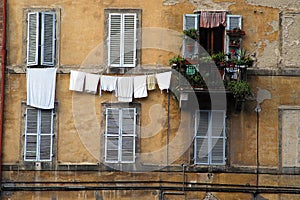 Laundry, windows, Siena, Italy photo
