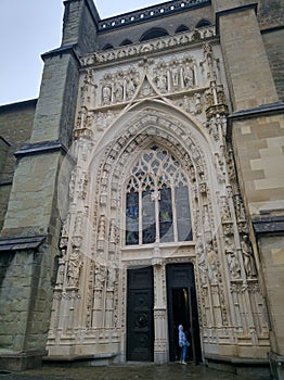 Lausanne, Switzerland - August 20, 2019: Beautiful view of Notre Dame Cathedral in Lausanne. The main entrance is decorated with