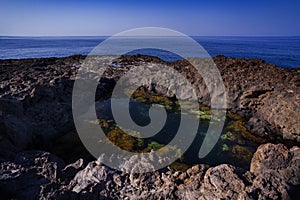 The lava beach of Linosa Called Piscine, Sicily photo