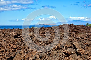 Lava Fields on Maui, Hawaii with Molokini in the distance