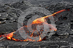 Lava flows out of a fissure