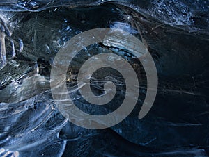 Lava rock trapped in the ice of the glacier