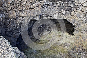 Lava tube cave opening deep in ground