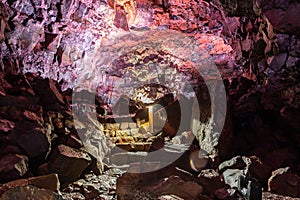 The Lava Tunnel (Raufarholshellir) in Iceland, inside view of the illuminated lava tube