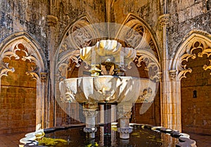 Lavabo fountain at the Batalha monastery in Portugal photo