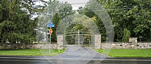 Car entrance of a luxurious residence in Laval on the lake photo