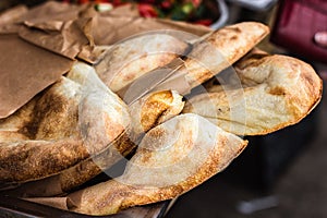 Lavash, Bakery Products fresh pastry sells pita market wheat tortillas close-up Caucasian kitchen Lavash Pita or Arabic bread trad