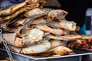 Lavash, Bakery Products fresh pastry sells pita market wheat tortillas close-up Caucasian kitchen Lavash Pita or Arabic bread trad