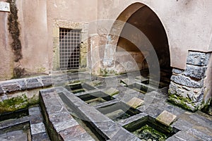 Lavatoio Medievale Fiume Cefalino, a Medieval wash house in the old town of Cefalu, Sicily, Italy photo