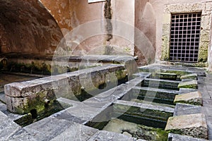 Lavatoio Medievale Fiume Cefalino, a Medieval wash house in the old town of Cefalu, Sicily, Italy photo