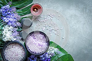 Lavender aromatherapy Spa with candle and rock spa. Thai Spa relax Treatments and massage concrete background. Healthy Concept.