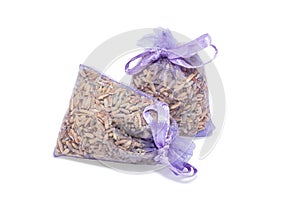 Lavender bag or pouch with dried lavender flowers isolated on white. Two aromatic sachet with dry lavender