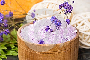 Lavender bath salt in a wooden jar, close-up