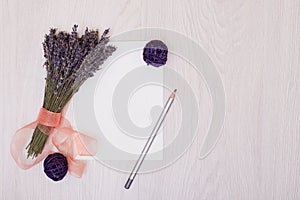 Lavender desk design with flowers on background top view mock up