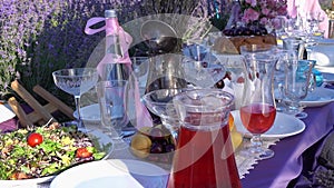 Lavender Fields, Food and Wine in Provence, France Travel. Romantic purple picnic table setting