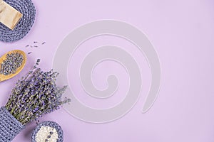 Lavender flowers are arranged on a purple background. c
