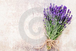 Lavender flowers, bouquet on rustic background, overhead.